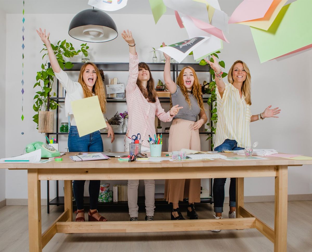 Happy teachers celebrating school automation